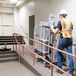 Image shows person pushing disassembled a PowerLift and two different use cases.