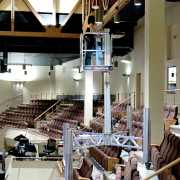 Person uses the PowerLift to gain access to the ceiling.