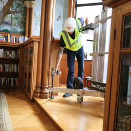 Person performs indoor maintenance.